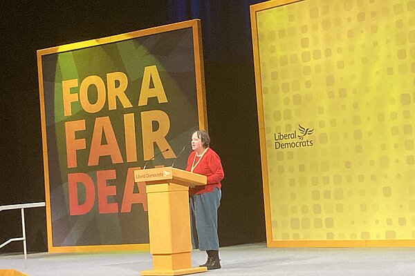 Jacquie Bell speaking at conference
